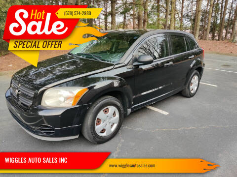 2011 Dodge Caliber for sale at WIGGLES AUTO SALES INC in Mableton GA