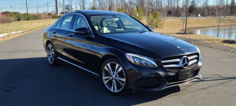 2015 Mercedes-Benz C-Class for sale at BOOST MOTORS LLC in Sterling VA