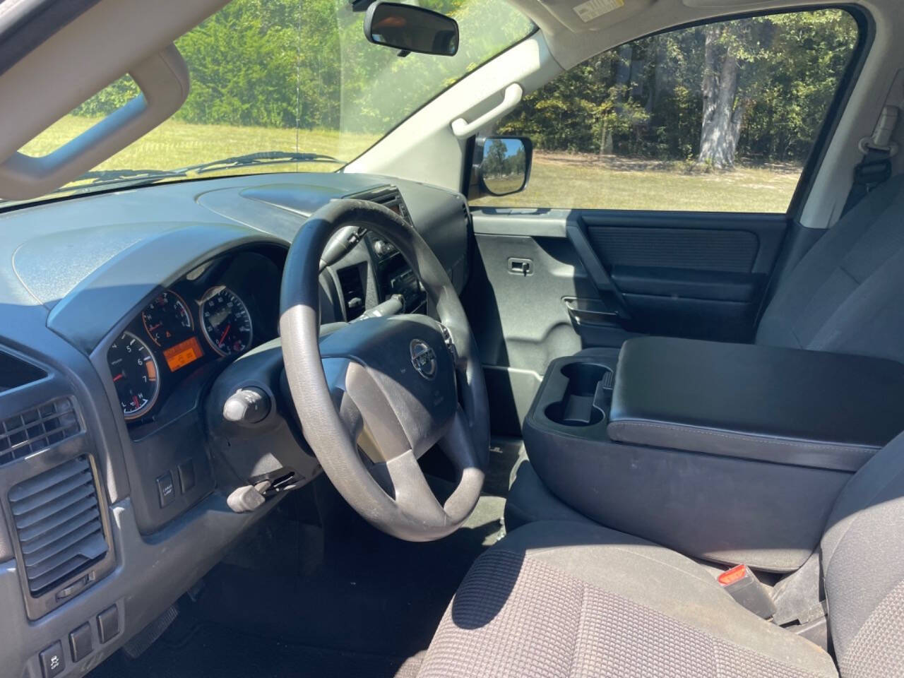 2013 Nissan Titan for sale at Russell Brothers Auto Sales in Tyler, TX