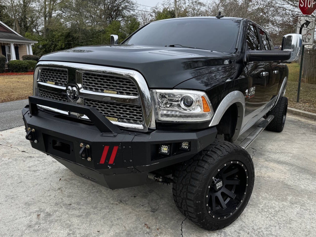 2015 RAM 2500 Laramie 4x4 4dr Mega Cab 6.3 ft. SB Pickup's photo