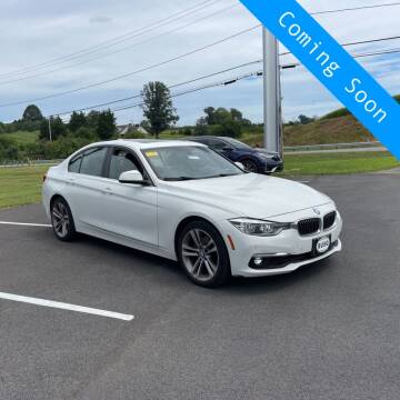 2016 BMW 3 Series for sale at INDY AUTO MAN in Indianapolis IN