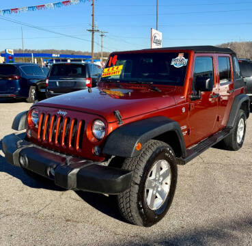 2014 Jeep Wrangler Unlimited for sale at Campbell Auto Sales in Batavia OH