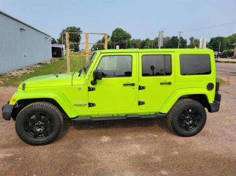 2012 Jeep Wrangler Unlimited for sale at KJ Automotive in Worthing SD