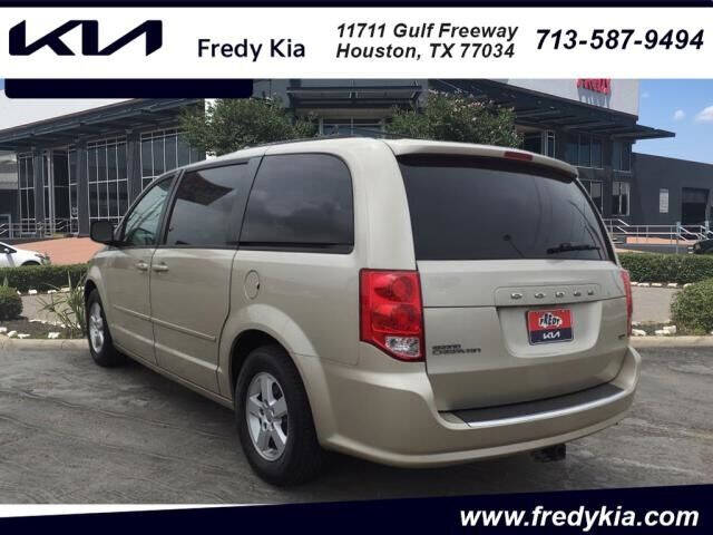 Used 2013 Dodge Grand Caravan SXT with VIN 2C4RDGCG9DR521811 for sale in Houston, TX