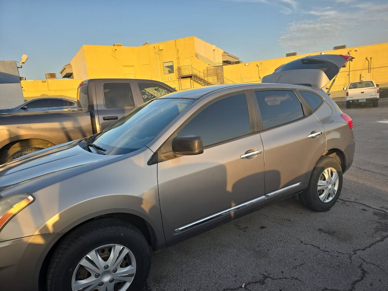 2013 Nissan Rogue for sale at QWEST AUTOMOTIVE SERVICES in Las Vegas, NV