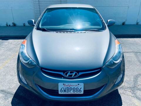 2013 Hyundai Elantra for sale at E and M Auto Sales in Bloomington CA