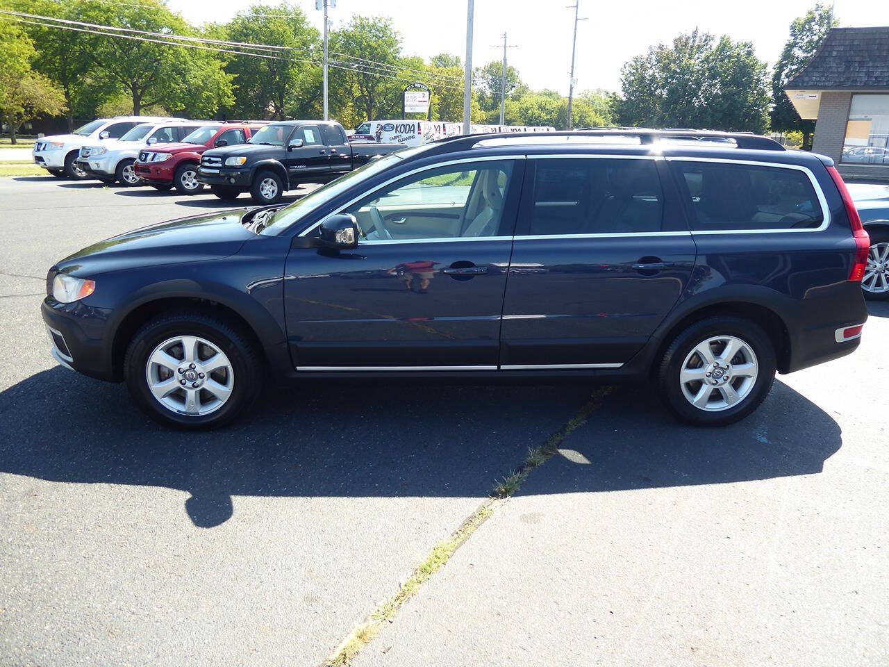 2010 Volvo XC70 for sale at Lakeshore Autos in Holland, MI