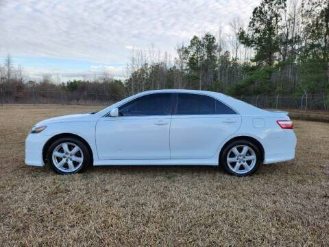 2009 Toyota Camry for sale at Poole Automotive in Laurinburg NC