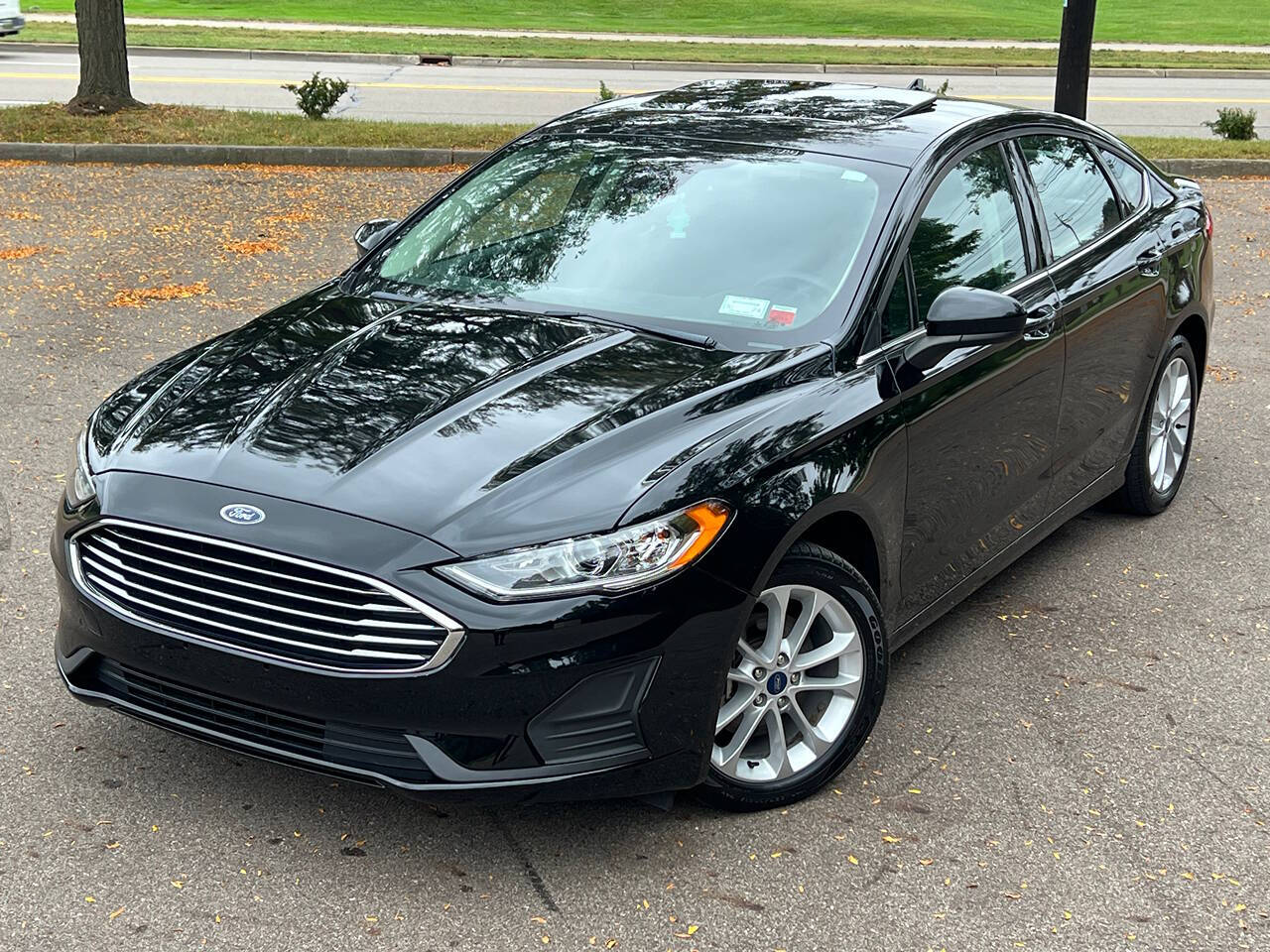 2020 Ford Fusion Hybrid for sale at Spartan Elite Auto Group LLC in Lansing, MI