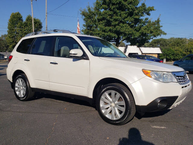 2011 Subaru Forester for sale at Auto Shop in Wyoming, MI