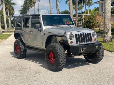 2009 Jeep Wrangler Unlimited for sale at BIG BOY DIESELS in Fort Lauderdale FL