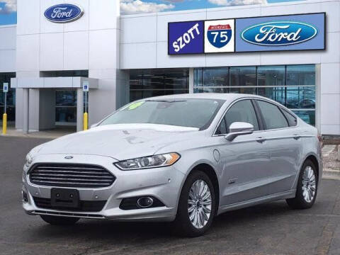 2014 Ford Fusion Energi for sale at Szott Ford in Holly MI