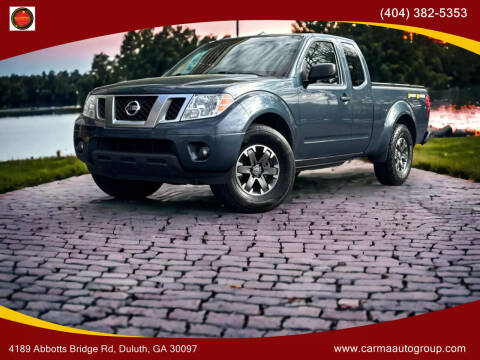 2014 Nissan Frontier for sale at Carma Auto Group in Duluth GA