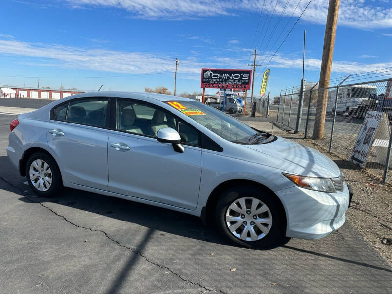 2012 Honda Civic for sale at CHINO'S AUTO SALES LLC in Fallon NV