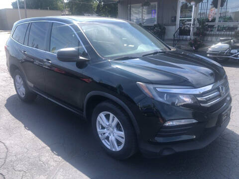 2016 Honda Pilot for sale at Tradewind Car Co in Muskegon MI