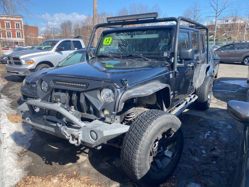 2012 Jeep Wrangler Unlimited for sale at Reyes Auto Sales in Holyoke MA