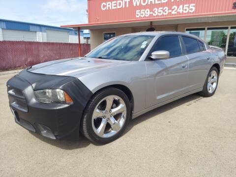 2014 Dodge Charger for sale at Credit World Auto Sales in Fresno CA