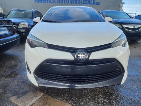 2019 Toyota Corolla for sale at America Auto Wholesale Inc in Miami FL