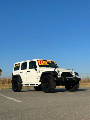 2016 Jeep Wrangler Unlimited for sale at Valdez Auto Sales in Gonzales CA