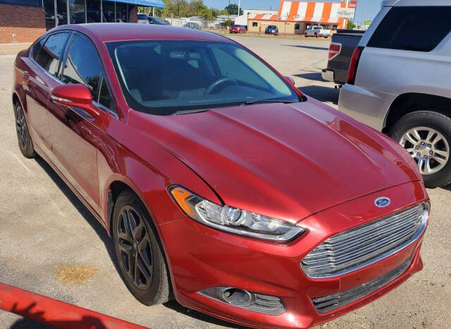 2015 Ford Fusion for sale at DURANGO AUTO CENTER LLC in Tulsa, OK