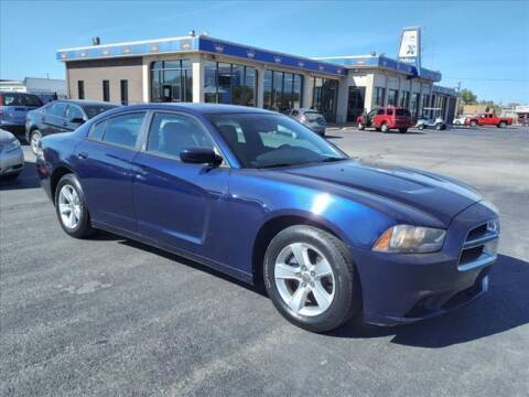 2014 Dodge Charger for sale at Credit King Auto Sales in Wichita KS
