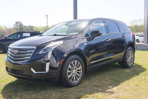 2019 Cadillac XT5 for sale at STRICKLAND AUTO GROUP INC in Ahoskie NC