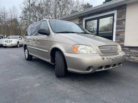 2005 Kia Sedona for sale at SELECT MOTOR CARS INC in Gainesville GA