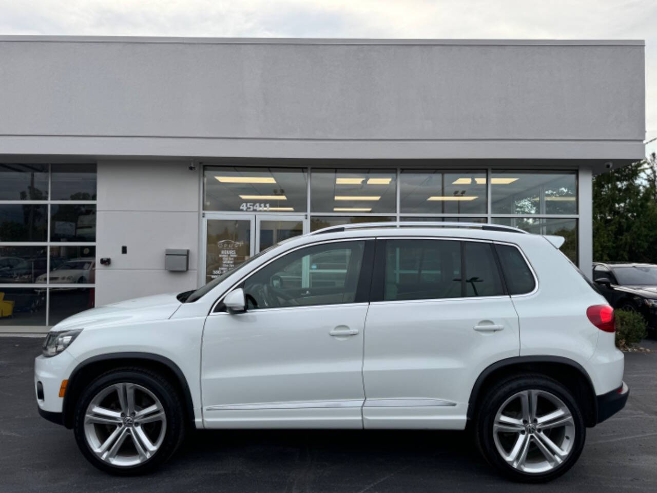 2014 Volkswagen Tiguan for sale at Opus Motorcars in Utica, MI