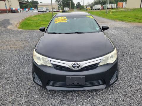 2012 Toyota Camry for sale at Auto Guarantee, LLC in Eunice LA