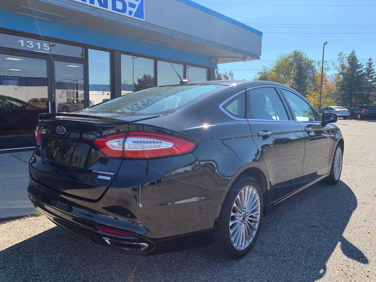 2016 Ford Fusion for sale at Cars On Demand LLC in Lansing, MI