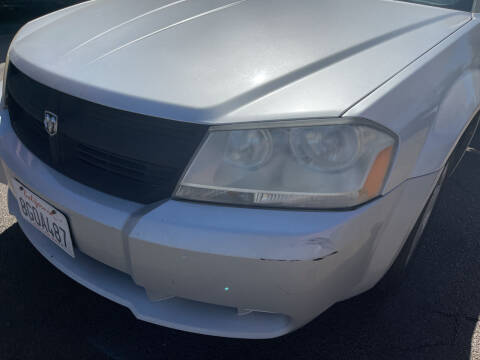 2010 Dodge Avenger for sale at Best Buy Auto Sales in Hesperia CA