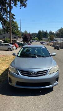 2013 Toyota Corolla for sale at Road Star Auto Sales in Puyallup WA