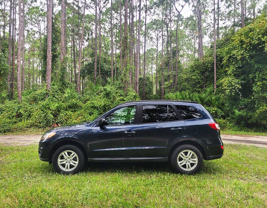 2011 Hyundai SANTA FE for sale at Flagler Auto Center in Bunnell, FL