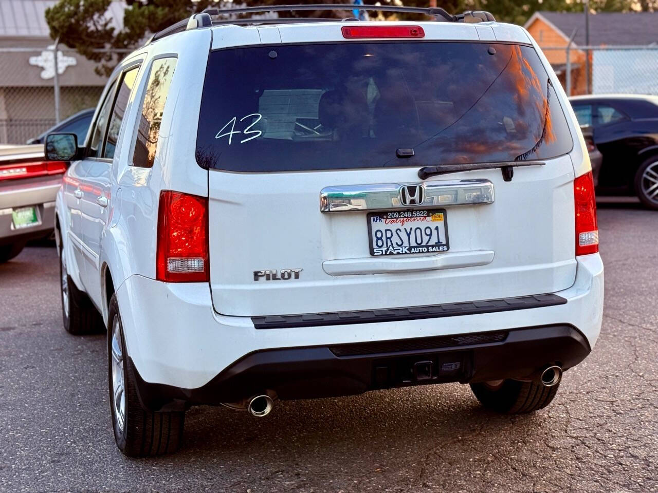 2013 Honda Pilot for sale at STARK AUTO SALES INC in Modesto, CA