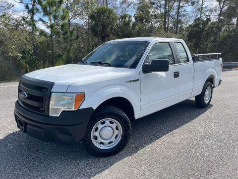 2014 Ford F-150 for sale at VICTORY LANE AUTO SALES in Port Richey FL
