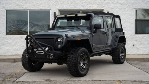 2014 Jeep Wrangler for sale at Classic Car Deals in Cadillac MI