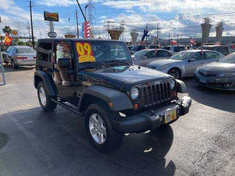 2009 Jeep Wrangler for sale at Texas 1 Auto Finance in Kemah TX