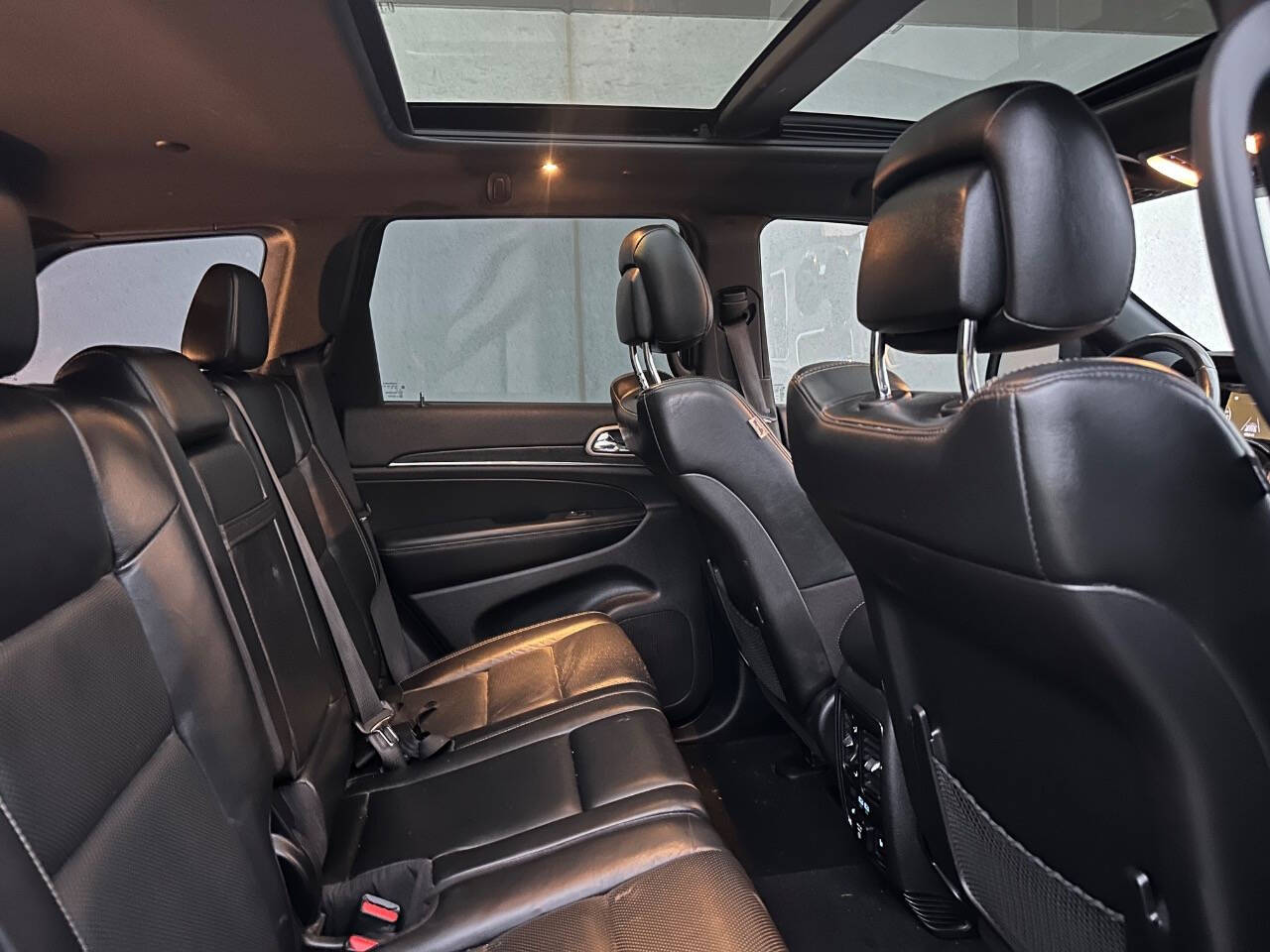 2021 Jeep Grand Cherokee for sale at Phoenix Motor Co in Romulus, MI