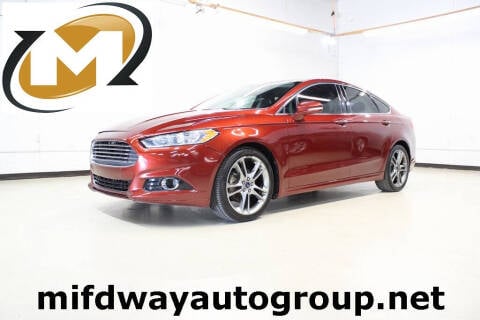 2014 Ford Fusion for sale at Midway Auto Group in Addison TX