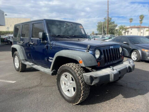 2013 Jeep Wrangler Unlimited for sale at Brown & Brown Auto Center in Mesa AZ