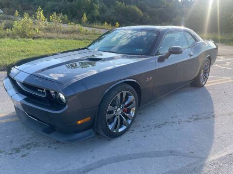 2013 Dodge Challenger for sale at Jim's Hometown Auto Sales LLC in Cambridge OH