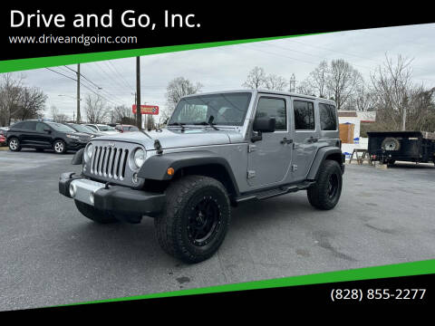 2014 Jeep Wrangler Unlimited for sale at Drive and Go, Inc. in Hickory NC