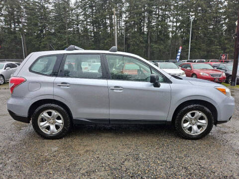 2014 Subaru Forester for sale at MC AUTO LLC in Spanaway WA