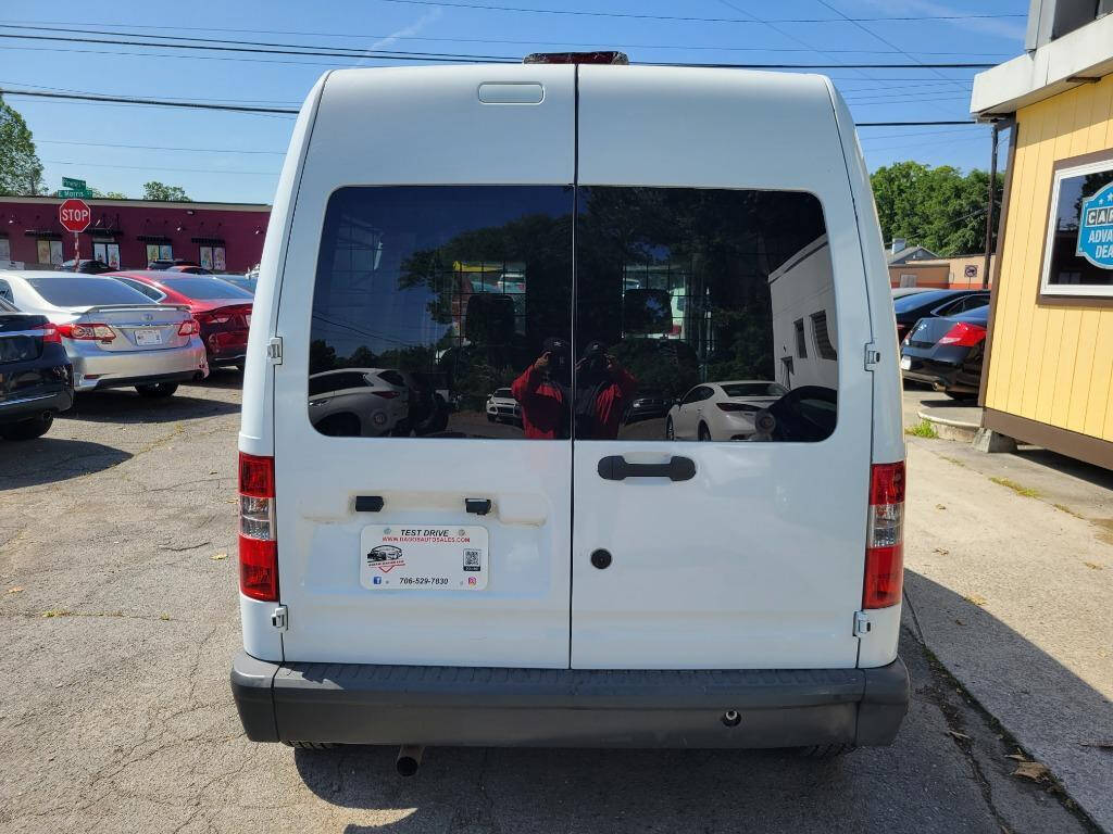 2012 Ford Transit Connect for sale at DAGO'S AUTO SALES LLC in Dalton, GA