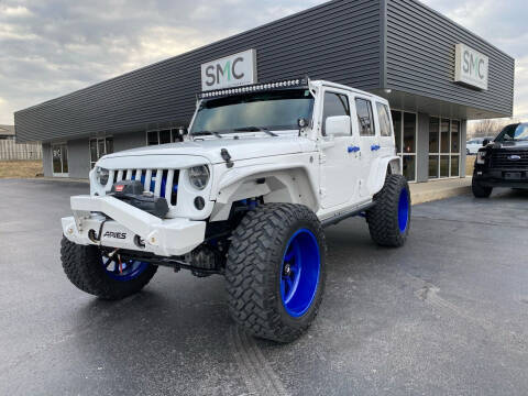 2013 Jeep Wrangler Unlimited for sale at Springfield Motor Company in Springfield MO