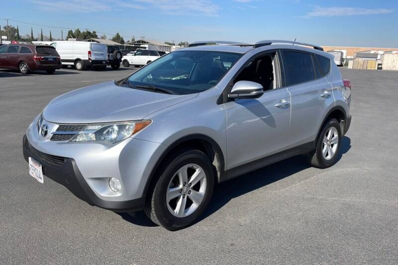 2014 Toyota RAV4 for sale at La Mesa Auto Sales in Huntington Park CA