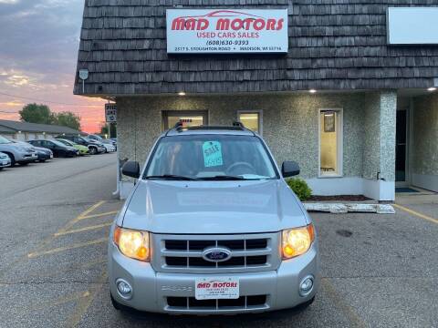 2009 Ford Escape Hybrid for sale at MAD MOTORS in Madison WI