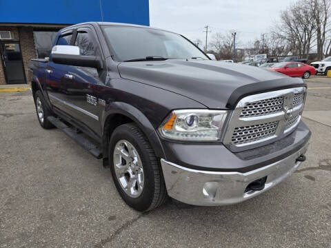 2014 RAM 1500 for sale at R Tony Auto Sales in Clinton Township MI
