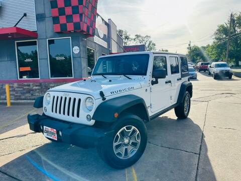 2014 Jeep Wrangler Unlimited for sale at Chema's Autos & Tires - Chema's Autos And Tires #2 in Tyler TX