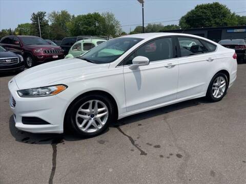 2016 Ford Fusion for sale at HUFF AUTO GROUP in Jackson MI